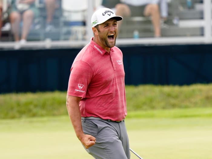 Jon Rahm reacts to his birdie putt on the 18th green during the final round of the U.S. Open golf tournament at Torrey Pines Golf Course.